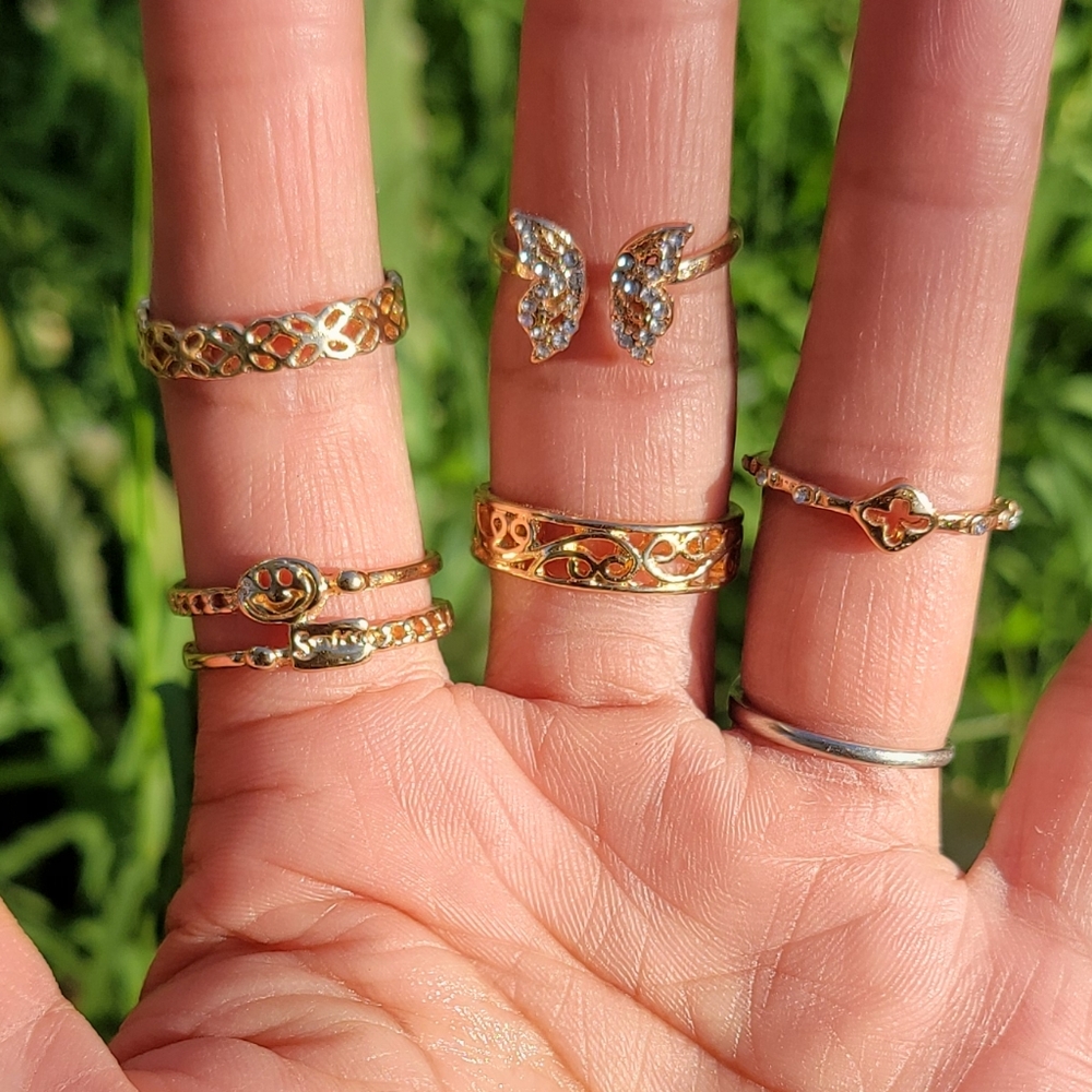 Super cute collection of five gold minimalist bohemian trendy rings